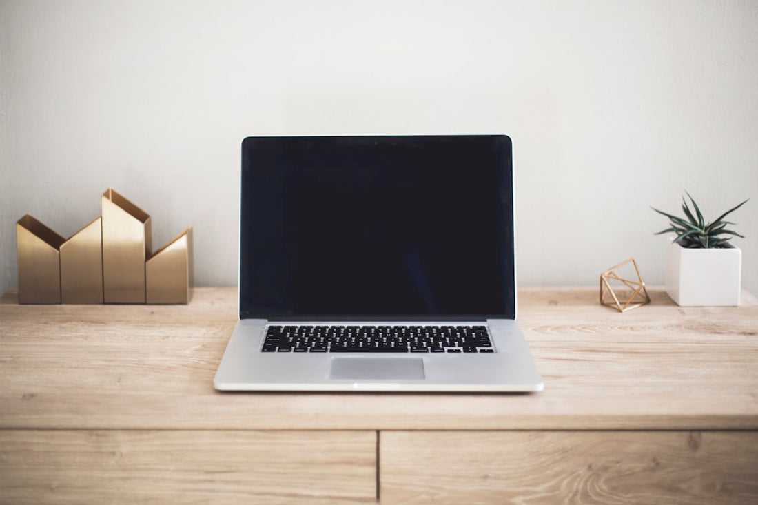 Laptop open on a desk for buying guide