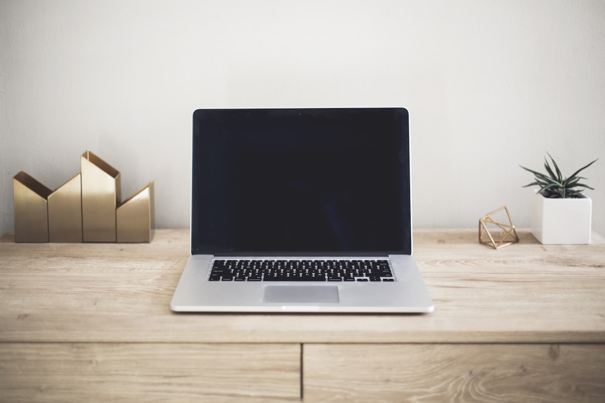 Laptop open on a desk for buying guide